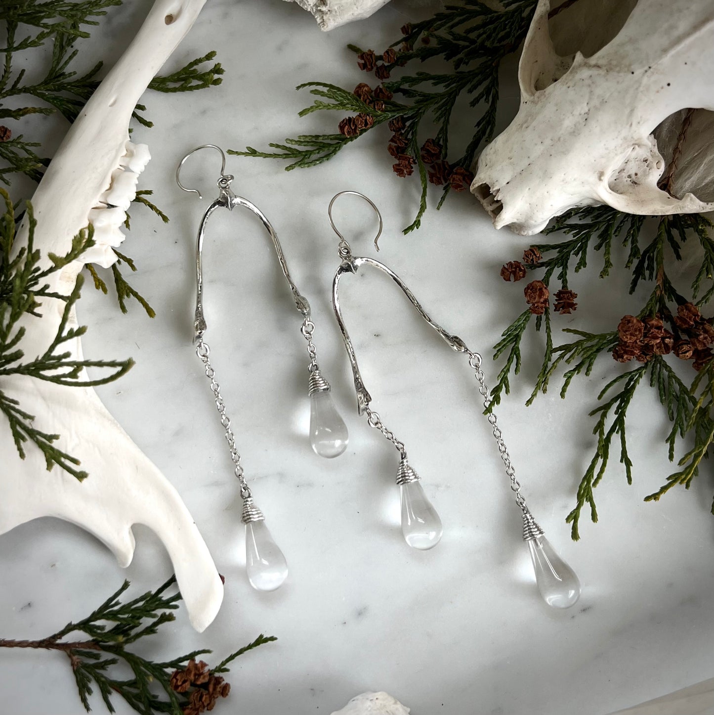 crow wishbone and quartz drop earrings