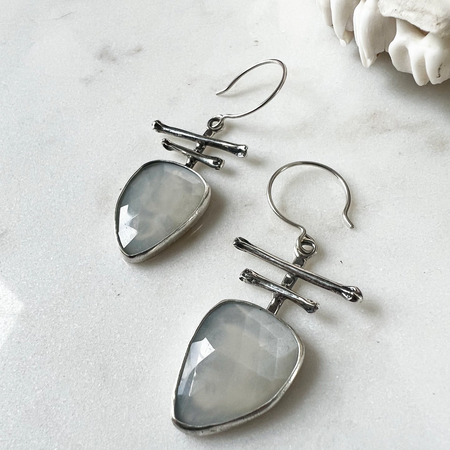 Totem earrings with faceted fancy White Moonstone