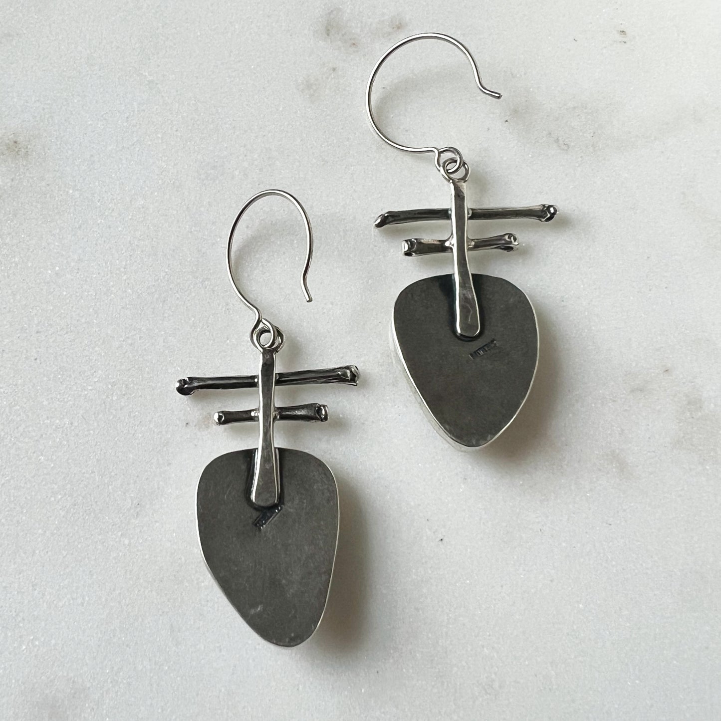 Totem earrings with faceted fancy White Moonstone