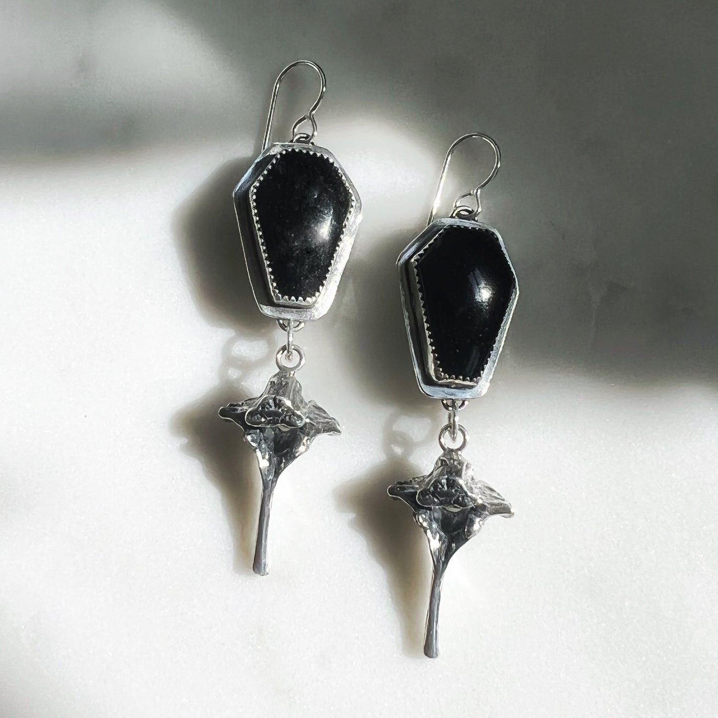 Black tourmaline coffins with sterling opossum vertebrae