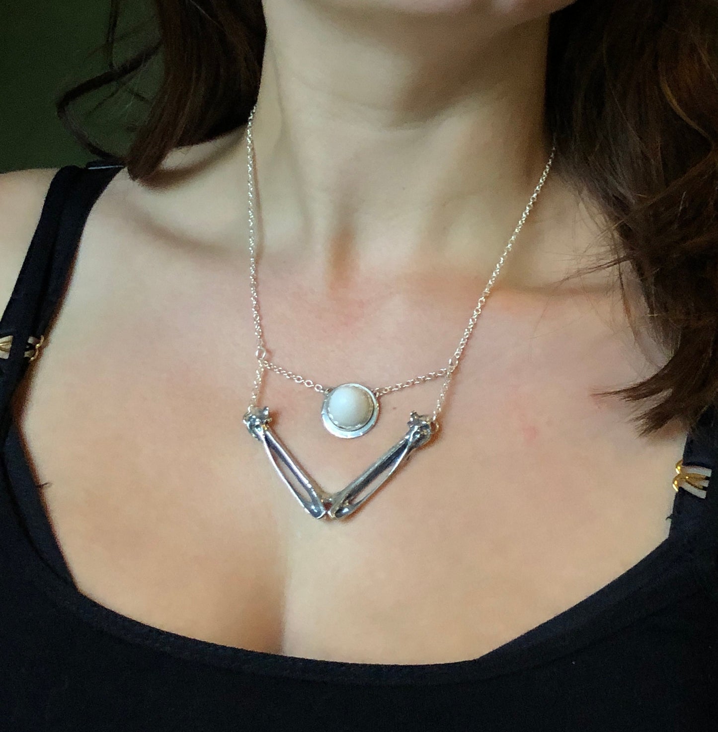 Crow wing bones necklace with faceted milk quartz
