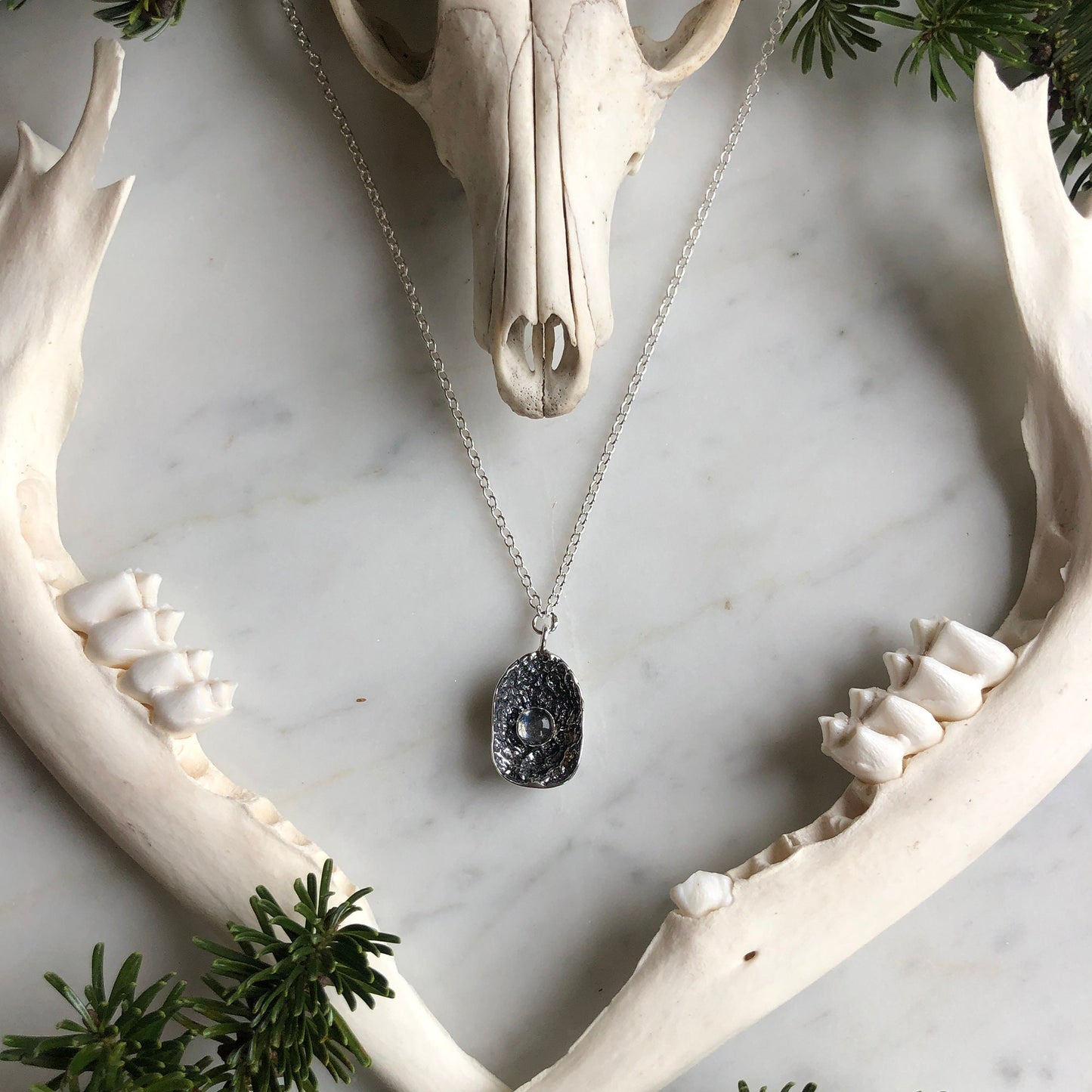 deer vertebral epiphysis necklace (7/8" cupped) with labradorite