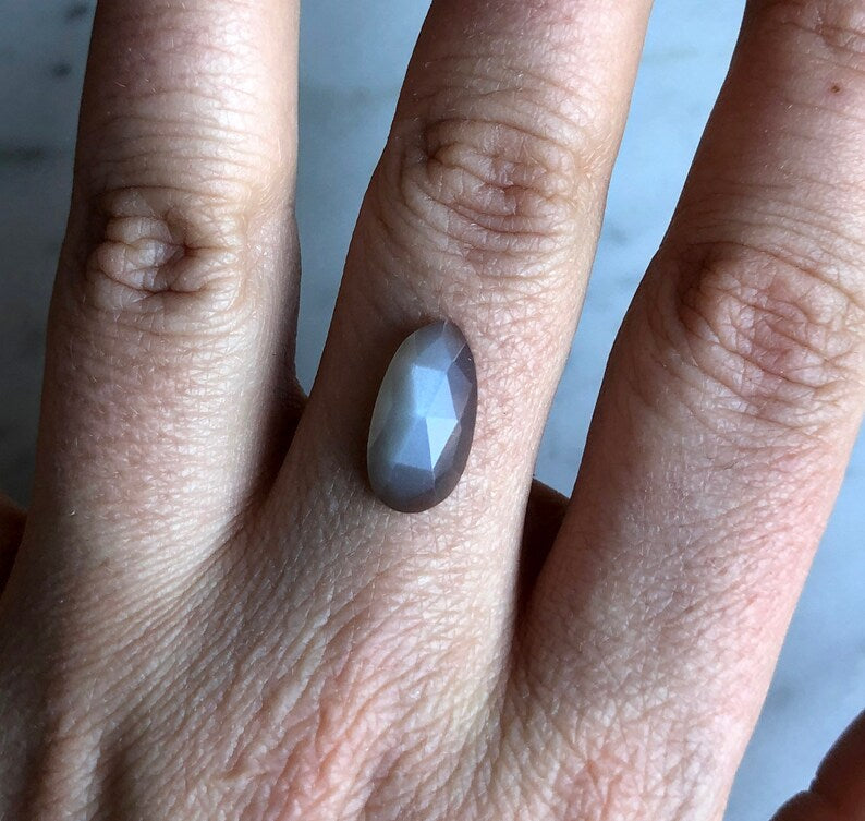 B. Faceted Grey Moonstone and squirrel toe bone ring. MADE TO ORDER