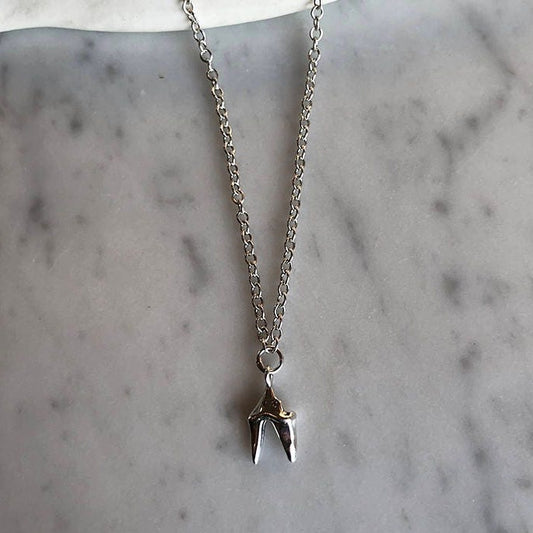 small neck fox tooth